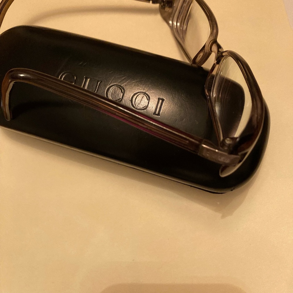 Gucci eyeglasses with case.